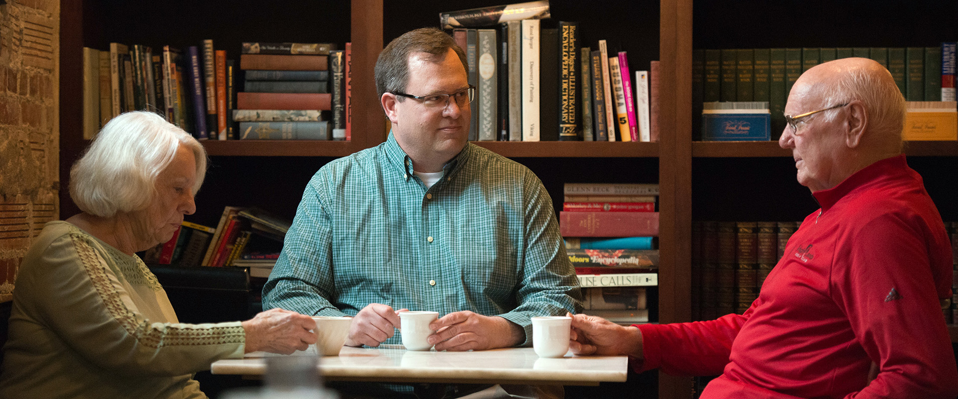 family-talking-coffee-discussion-advice