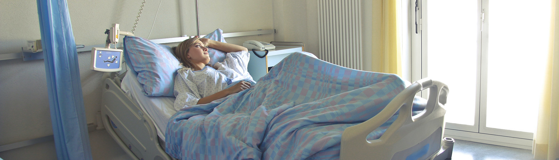 woman-hospital-bed